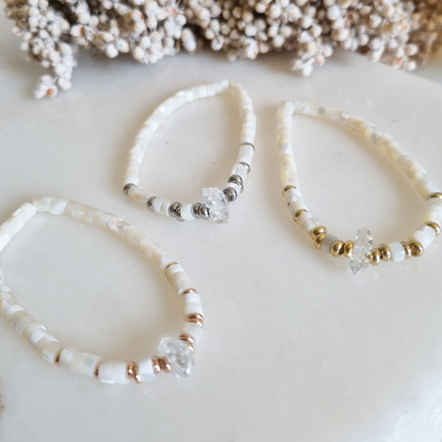 Mother of pearls and herkimer diamond bracelet, gold; rose gold; silver